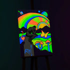 a glow in the dark painting made with luminescent glowing paint, used colours green, orange, blue, red