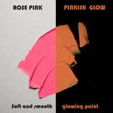 Side-by-side swatch of Rose Pink in daylight and radiant pinkish glow in the dark acrylic paint under blacklight—engineered for best-in-class coverage and up to 8-hour long-lasting luminescence.