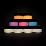 Static pyramid of 9 blacklight-reactive acrylic paint jars showcasing the best UV-charged hues for DIY projects