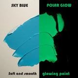 Side-by-side swatch of Blue to Polar paint showing sky blue in daylight and frosty polar blue glow under blacklight—engineered for maximum glow intensity and 8-hour luminescence