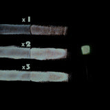 Nighttime glow demonstration of clear-white to white acrylic paint layers—neon UV-reactive formula delivering vibrant, long-lasting white luminescence for DIY crafts and professional installations