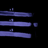 Neon UV-reactive clear-white-to-purple paint layers glowing deep violet in darkness—optimized for intense glow-to-color ratio and weatherproof performance in outdoor décor and event signage