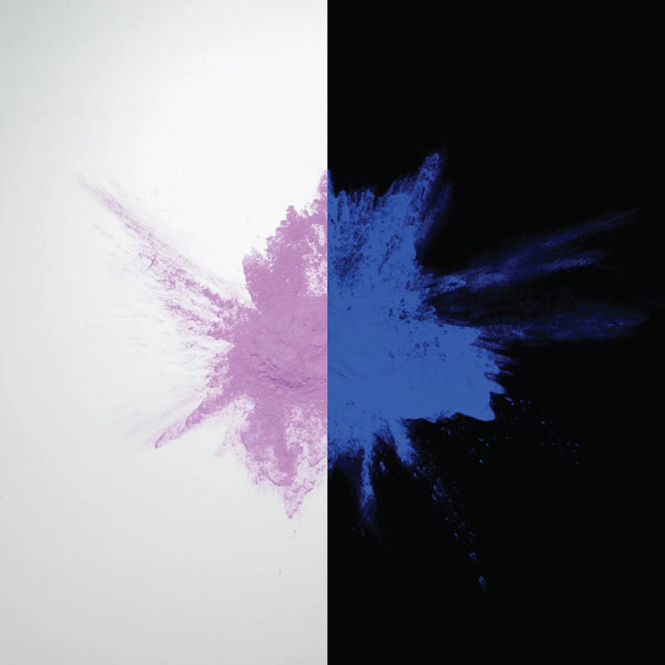 Glow-in-the-dark Purple-to-Blue pigment powder bursting in a neon splash—delivering intense, durable luminescence for party décor, safety markings, and professional installations