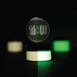 Jar of strontium aluminate Clear White to Green glow pigment powder—industrial-grade, non-toxic formula delivering long-lasting neon-green luminescence for canvas, wood, rocks, and metal décor.