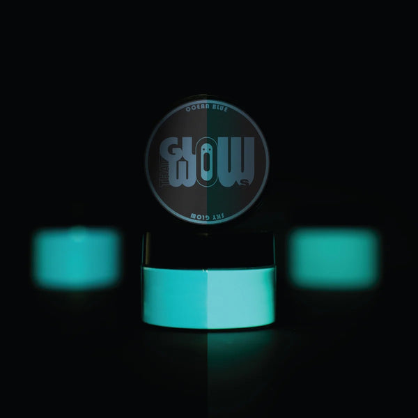 Strontium aluminate Ocean Blue to Sky pigment powder jar with neon aqua spots—industrial-grade formula engineered for maximum glow retention in epoxy, nail art, and outdoor décor