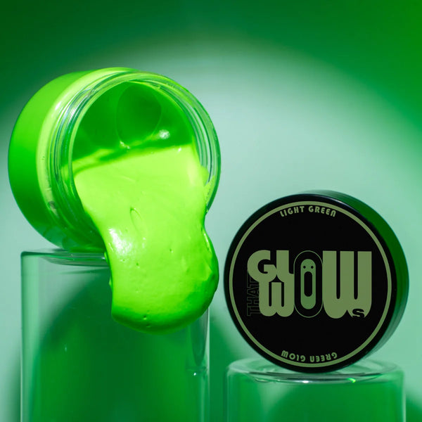 Pouring UV-reactive Light Green to Green glow acrylic paint—smooth, non-toxic formula ideal for polymer clay, fabric art, and safety signage with vivid after-dark glow