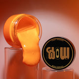 Pouring UV-reactive Orange to Tangerine glow in the dark paint—smooth, non-toxic acrylic perfect for metal art, halloween pumpkin, polymer clay, and fabric with vivid after-dark orange luminescence.