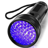 Black UV LED flashlight with blackllight on a white background