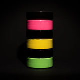 Static pyramid of three blacklight-reactive acrylic paint jars in neon pink, yellow, and green—ideal for UV art, DIY crafts, and premium gift-ready sets