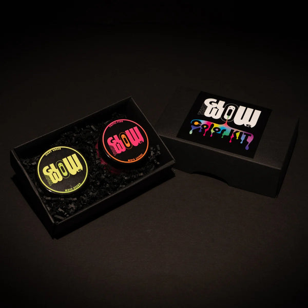 Daylight view of 2-color glow-in-the-darkacrylic paint in yellow and pink—ideal for clay modeling, wood carvings and fabric prints