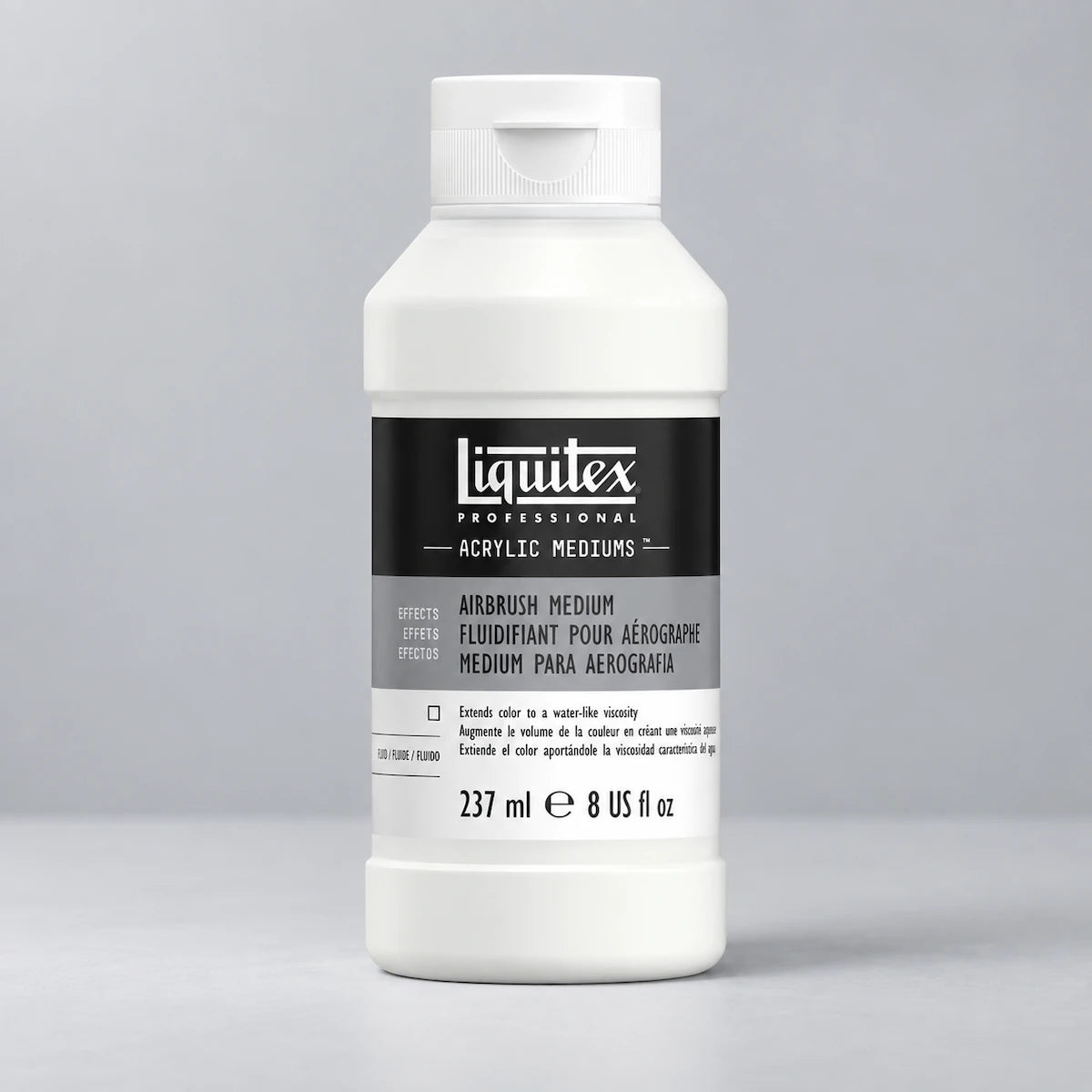A white plastic bottle of Liquitex Professional Acrylic Mediums Airbrush Medium, 237 ml (8 US fl oz), with a black and gray label, set against a neutral gray background.