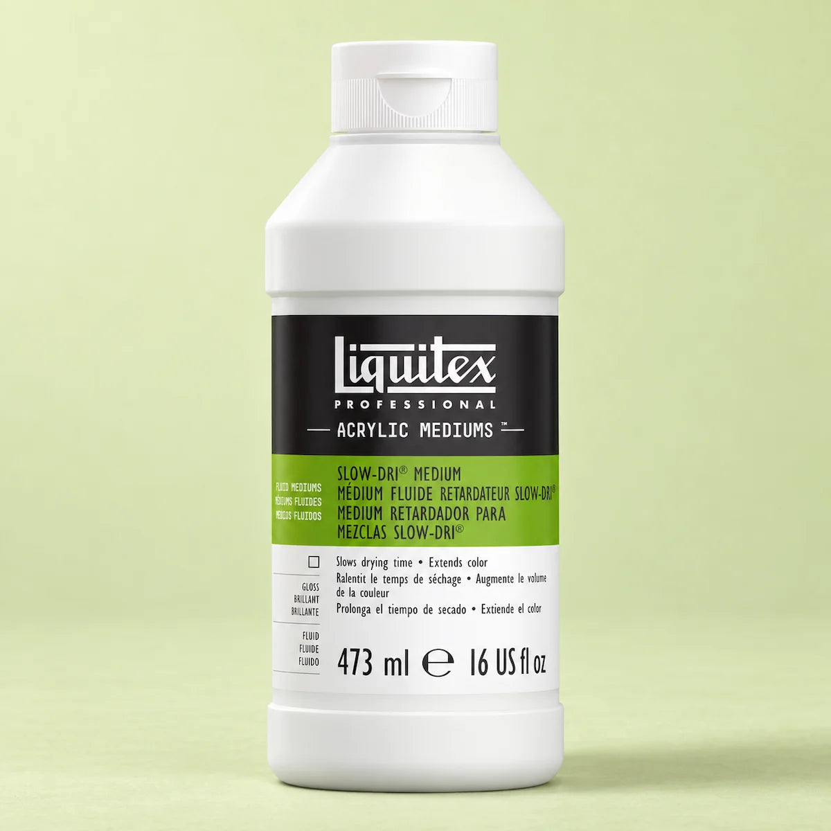 A bottle of Liquitex Professional Slow-Dry Medium acrylic paint on a light green background.