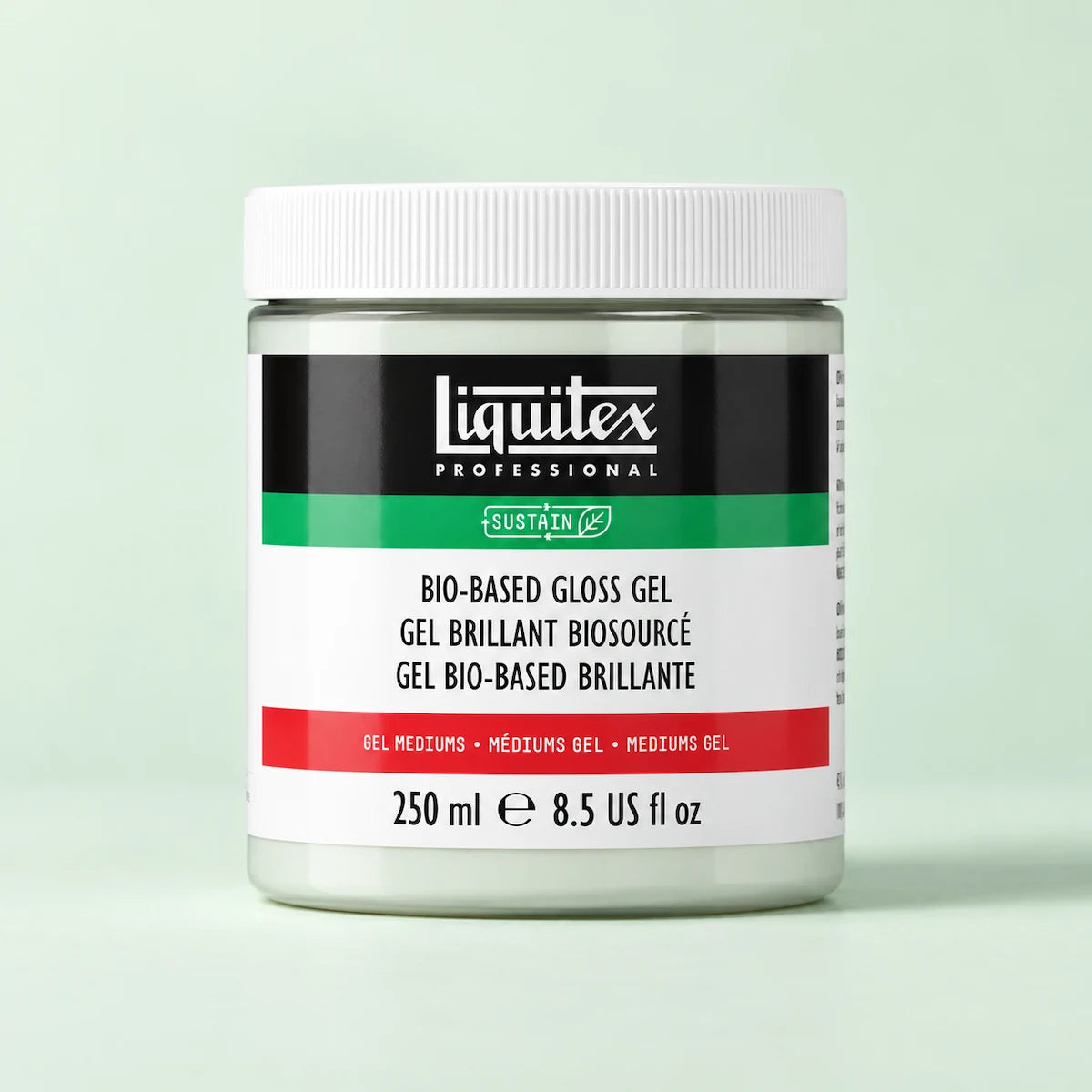 A jar of Liquitex Professional Bio-Based Gloss Gel in a white container with a white cap, featuring a black, green, and red label, set against a solid pale green background.