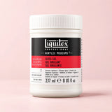 A white plastic jar of Liquitex Professional Gloss Gel Acrylic Mediums paint, set against a solid light pink background.