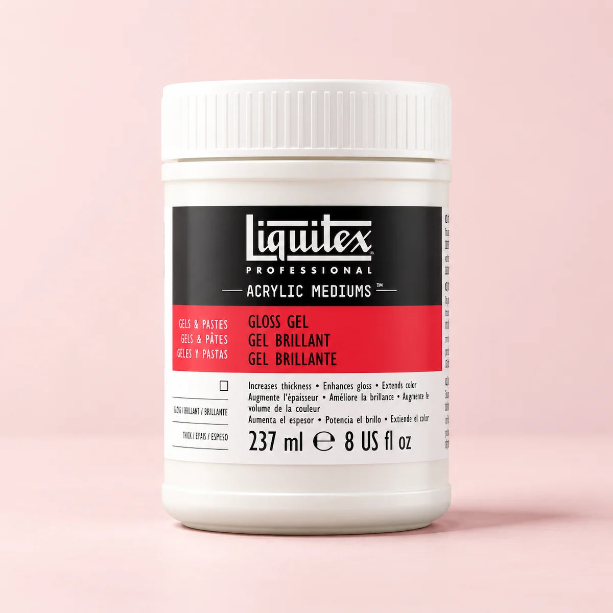 A white plastic jar of Liquitex Professional Gloss Gel Acrylic Mediums paint, set against a solid light pink background.