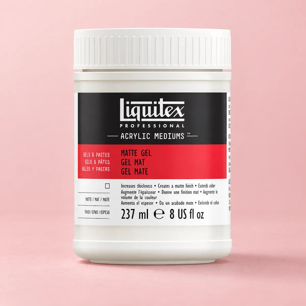 A white plastic jar of Liquitex Professional Acrylic Mediums Matte Gel, featuring a black and red label, set against a solid light pink background.