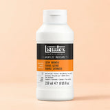 A bottle of Liquitex Professional Satin Varnish acrylic medium in a white plastic container with a black and orange label, set against a solid pale peach background.