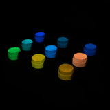 Charged strontium aluminate glow paint in 9 jars arranged in neat rows—delivering intense, long-lasting glow for night-time art