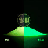 a strontium aluminate pigment in daylight and night light. yellow to green transformation